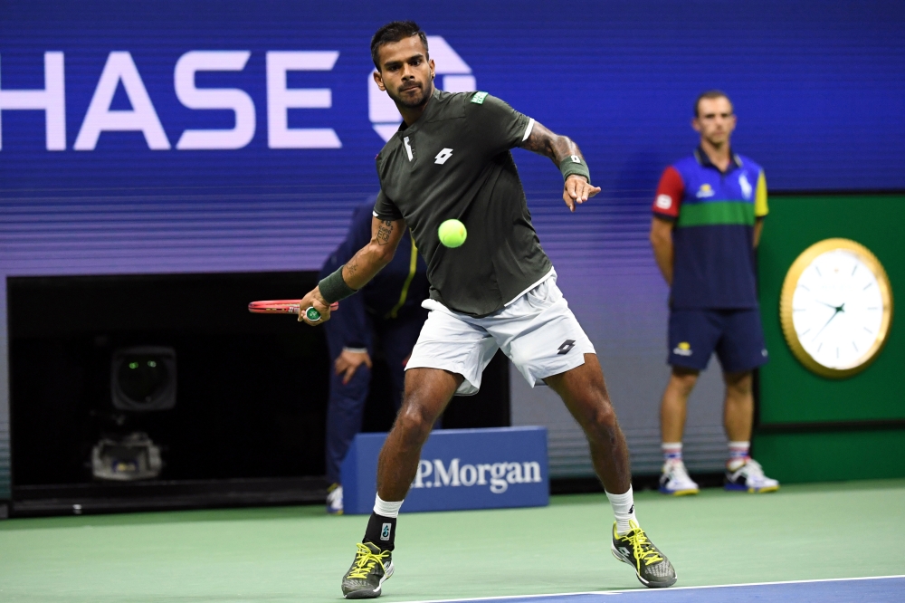 Sumit Nagal of India hits to Roger Federer of Switzerland in the first round on day one of the 2019 U.S. Open tennis tournament at USTA Billie Jean King National Tennis Center. Mandatory Credit: Danielle Parhizkaran-USA TODAY Sports/File Photo