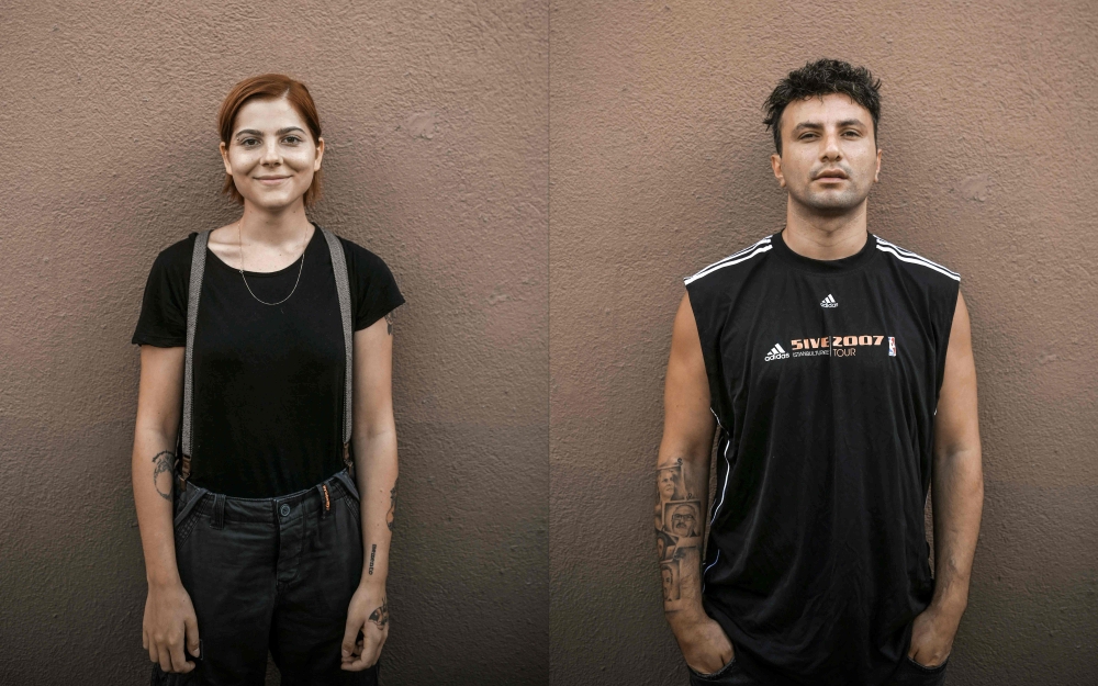 Turkish musician Deniz Tekin (L) and rap singer Samet Gonullu (R), whose stage name is Sokrat St, posing for a portrait on September 10, 2019 in Istanbul. AFP / Bulent Kilic 