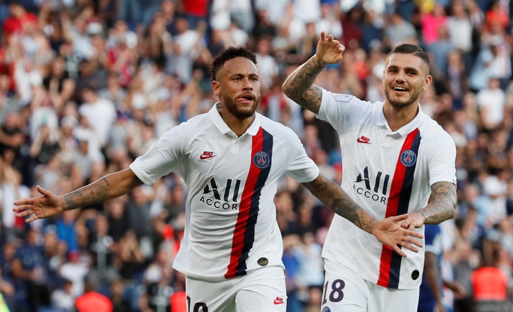 Paris St Germain's Neymar celebrates scoring their first goal with Mauro Icardi REUTERS/Gonzalo Fuentes