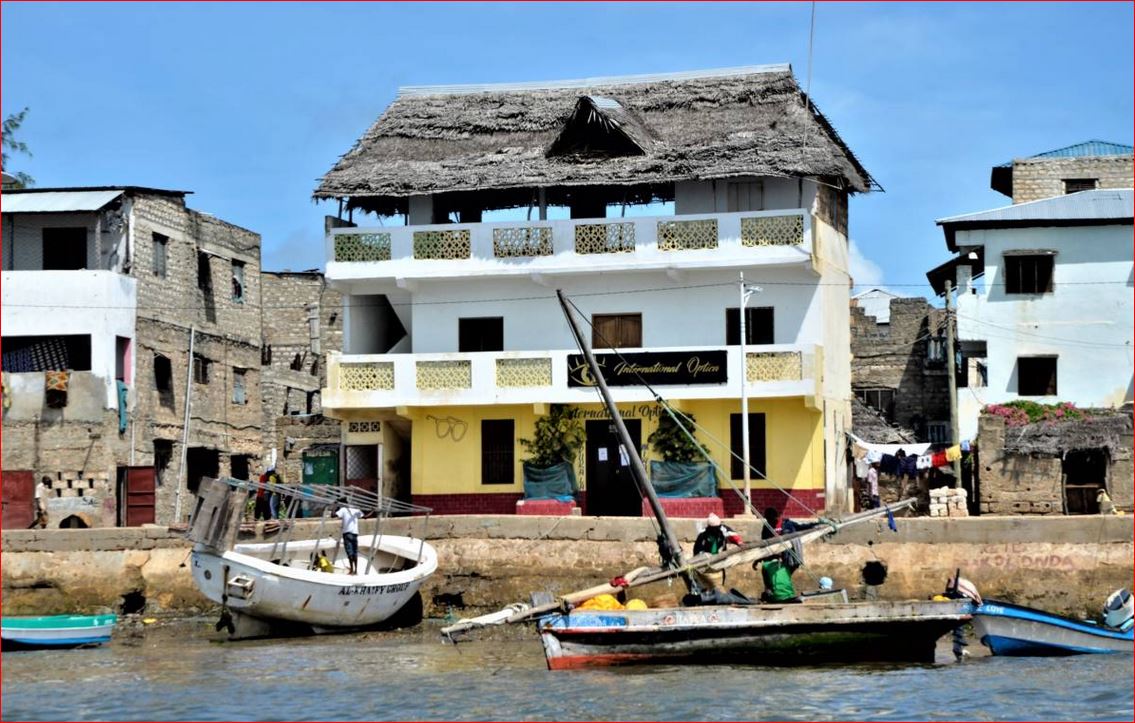 Boats bob in the water at Lamu island, a UNESCO World Heritage site and tourist island known for being one of the world's oldest Swahili settlements. Kenya, July 26, 2019. Thomson Reuters Foundation/Kim Harrisberg