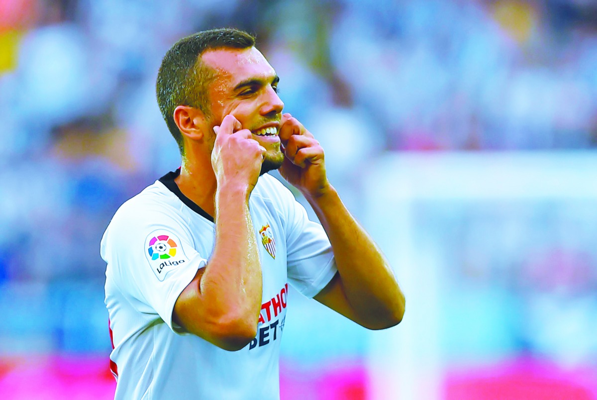 Sevilla's Spanish midfielder Joan Jordan celebrates after scoring a goal during the Spanish league football match Deportivo Alaves against Sevilla FC at the Mendizorrotza stadium in Vitoria on September 15, 2019. AFP / Ander Gillenea

