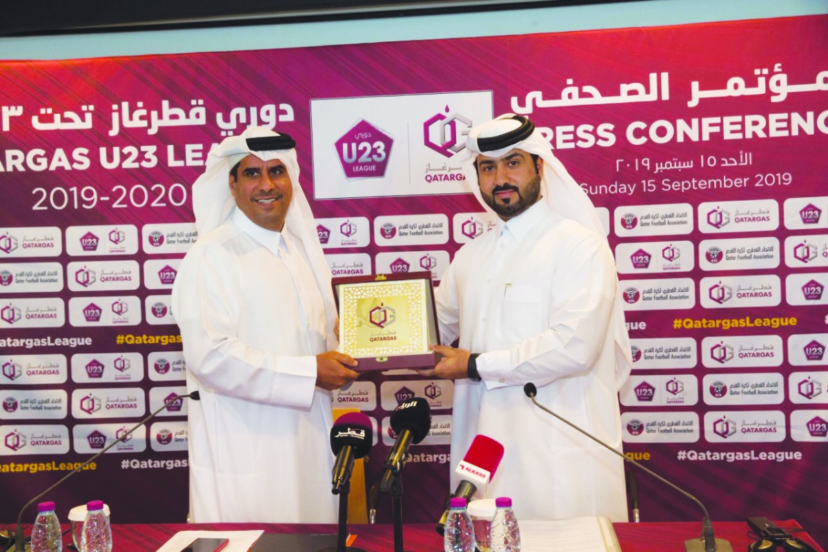 Khalid Mubarak Al Kuwari, Director of Marketing and Communications, QFA, and Ali Ibrahim Al Sulaiti, Public Relations Manager, Qatargas following the launch of third Qatargas U-23 League season at Al Bidda Tower, yesterday. 