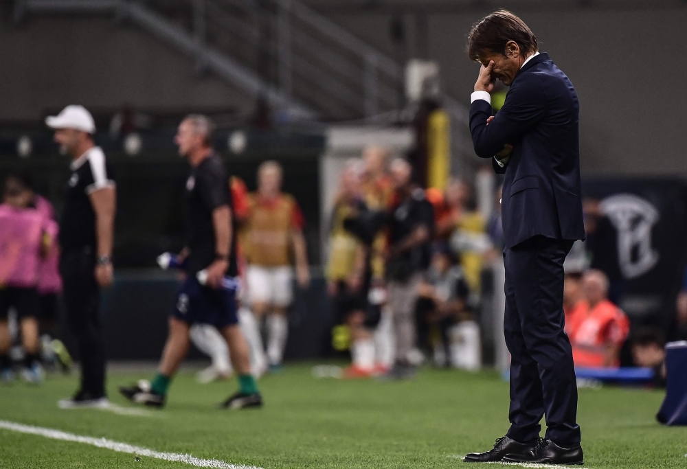 Inter Milan's Italian head coach Antonio Conte reacts during the UEFA Champions League Group F football match Inter Milan vs Slavia Prague on September 17, 2019 at the San Siro stadium in Milan. / AFP / Marco Bertorello