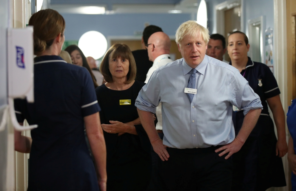 Britain's Prime Minister Boris Johnson visits Whipps Cross University Hospital in Leytonstone, London, Britain September 18, 2019. Yui Mok/ REUTERS