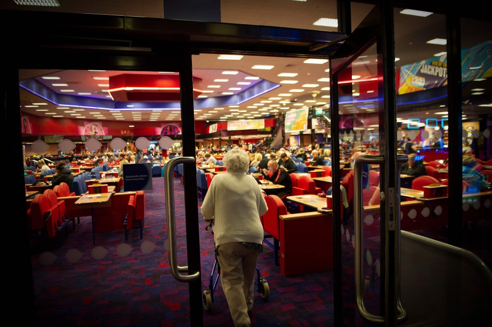 Customers play bingo at the MECCA Bingo Hall in the East End of Glasgow, Scotland on August 15, 2019. AFP / Andy Buchanan