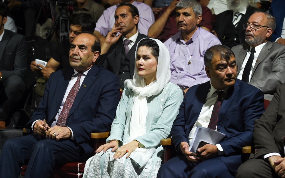 In this photo taken on August 3, 2019, movie director Sahraa Karimi (C) attends the Afghan Film Festival opening at Kabul University in Kabul. AFP / Wakil Kohsar