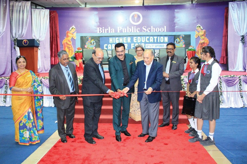 President of Indian Business and Professionals Council (IBPC), Azim Abbas; Vice-Chairman, Gope Shahani; Birla Public School Principal A P Sharma; and others  inaugurating the Higher Education Career Fair held at Birla Public School Doha.