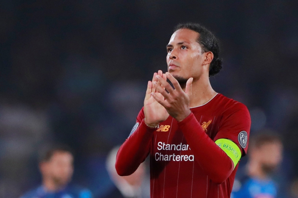 Liverpool's Virgil van Dijk applauds fans after the match Action Images via Reuters/Andrew Couldridge