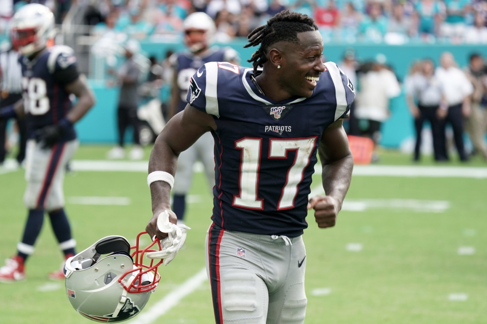 New England Patriots wide receiver Antonio Brown (17) celebrates in the fourth quarter against the Miami Dolphins at Hard Rock Stadium. Credit: Kirby Lee-USA TODAY Sports