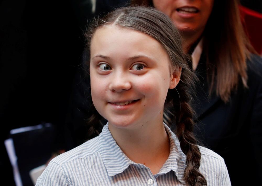 Greta Thunberg leaves after speaking at the Senate in Rome, Italy, April 18, 2019. Reuters / Remo Casilli