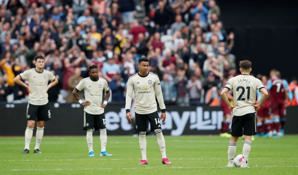 Manchester United's Jesse Lingard looks dejected after West Ham United's second goal REUTERS/David Klein 