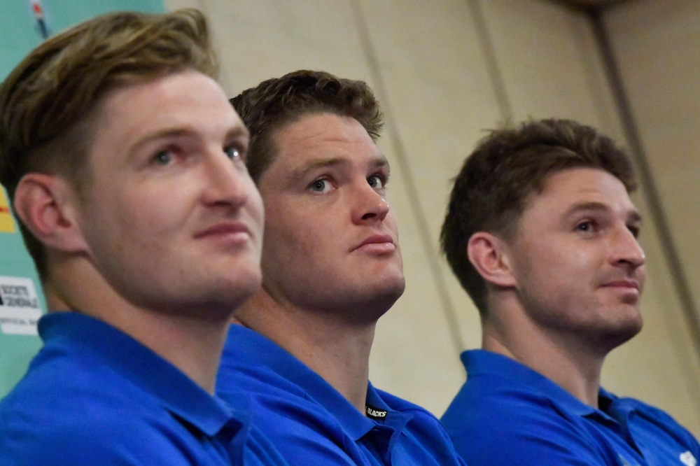 New Zealand's Barrett brothers Jordie (L), Scott (C) and Beauden (R) attend a press conference in Beppu on September 25, 2019, during the Japan 2019 Rugby World Cup. / AFP / Christophe SIMON