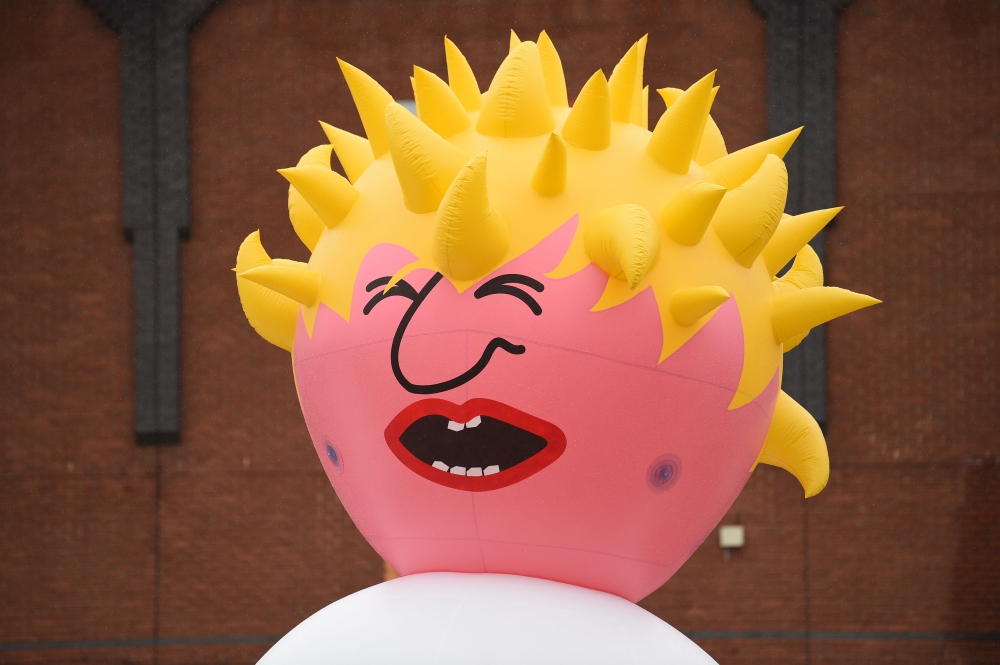 An inflatable effigy resembling Boris Johnson is seen amid a demonstration in central Manchester on September 29, 2019. AFP / Oli Scarff 