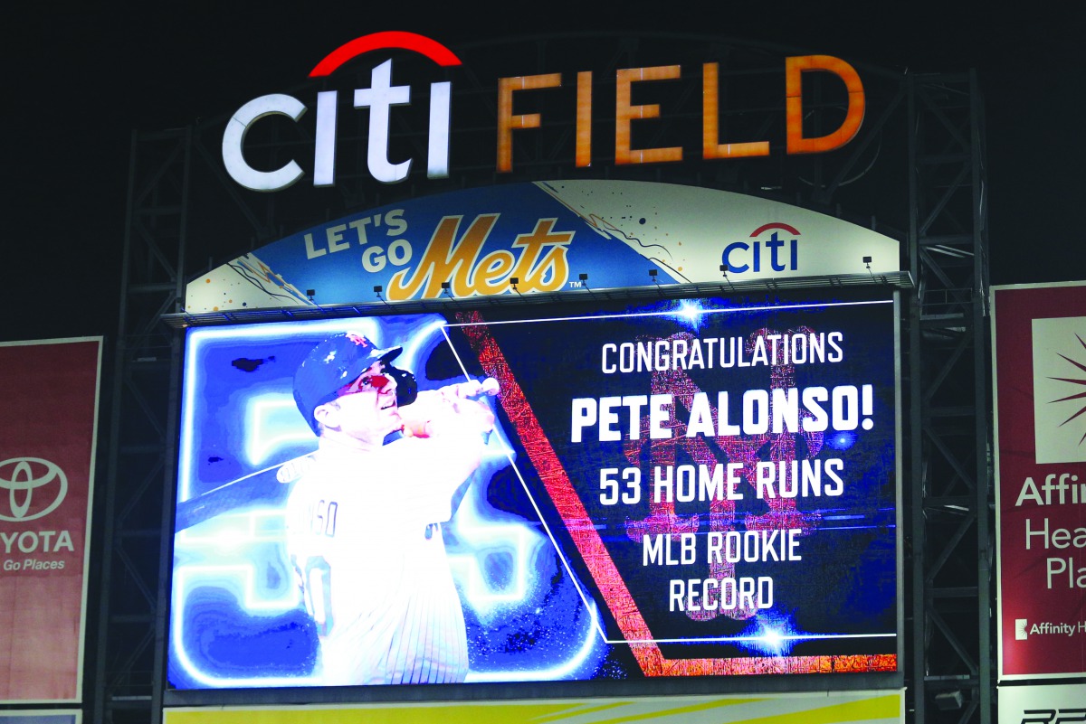The scoreboard at Citi Field displays a congratulatory message to New York Mets first baseman Pete Alonso (20) for breaking the MLB rookie home run record during the game against the Atlanta Braves. Credit: Brad Penner-USA TODAY Sports