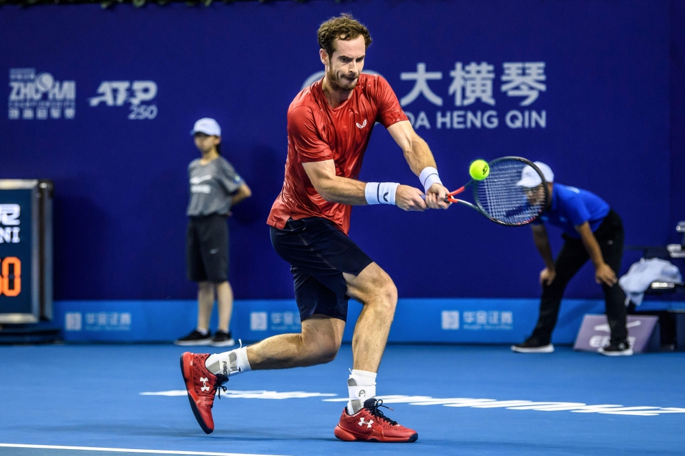 Andy Murray of Britain hits a return against Alex de Minaur of Australia during their men's singles second-round match at the Zhuhai Championships tennis tournament in Zhuhai in China's southern Guangdong province on September 26, 2019. China OUT / AFP / 