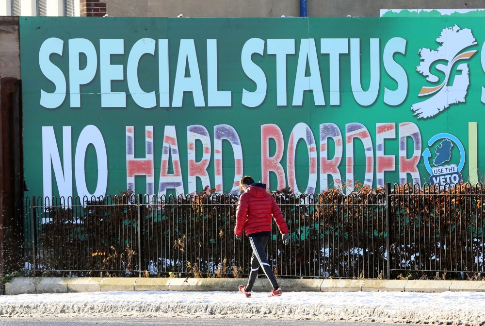 A billboard in west Belfast erected by Republican Party Sinn Fein calling for a special status for northern Ireland with respect to Brexit and no hard borders in Ireland on December 08, 2017. AFP / Paul Faith