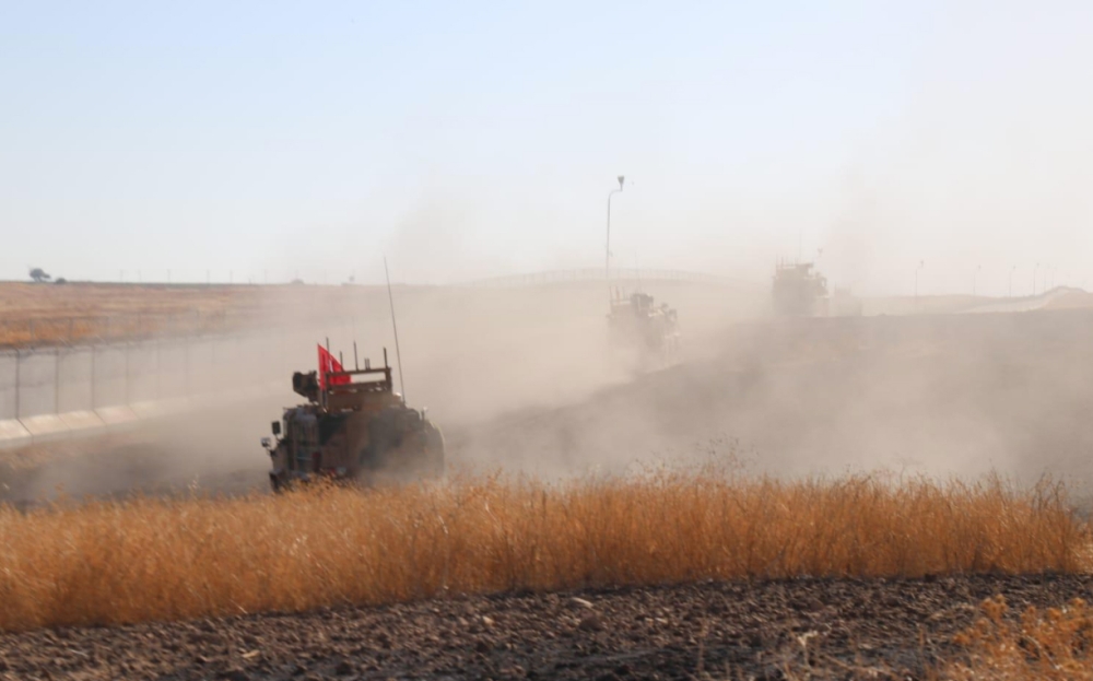 U.S. and Turkish troops conduct their third joint ground patrol within a planned safe zone in northern Syria, along the Syrian-Turkish border in Tell Abyad, Syria on October 04, 2019