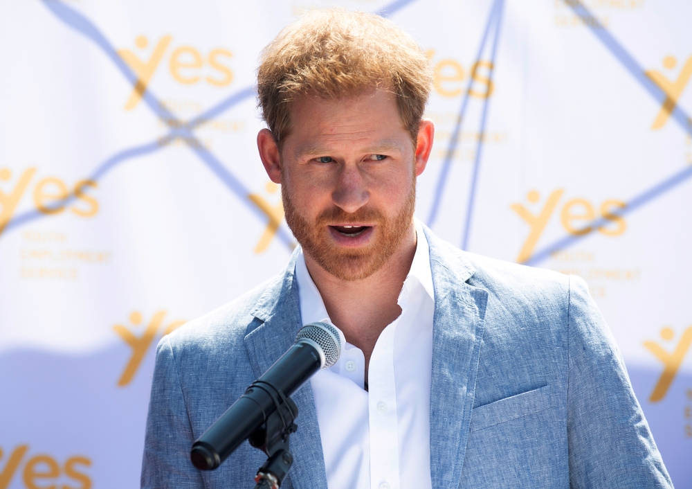 FILE PHOTO: Britain's Prince Harry, the Duke of Sussex, speaks at the Youth Employment Services (YES) Hub as he and his wife Meghan, the Duchess of Sussex, visit a township in Johannesburg, South Africa, October 2, 2019. Facundo Arrizabalaga/File Photo