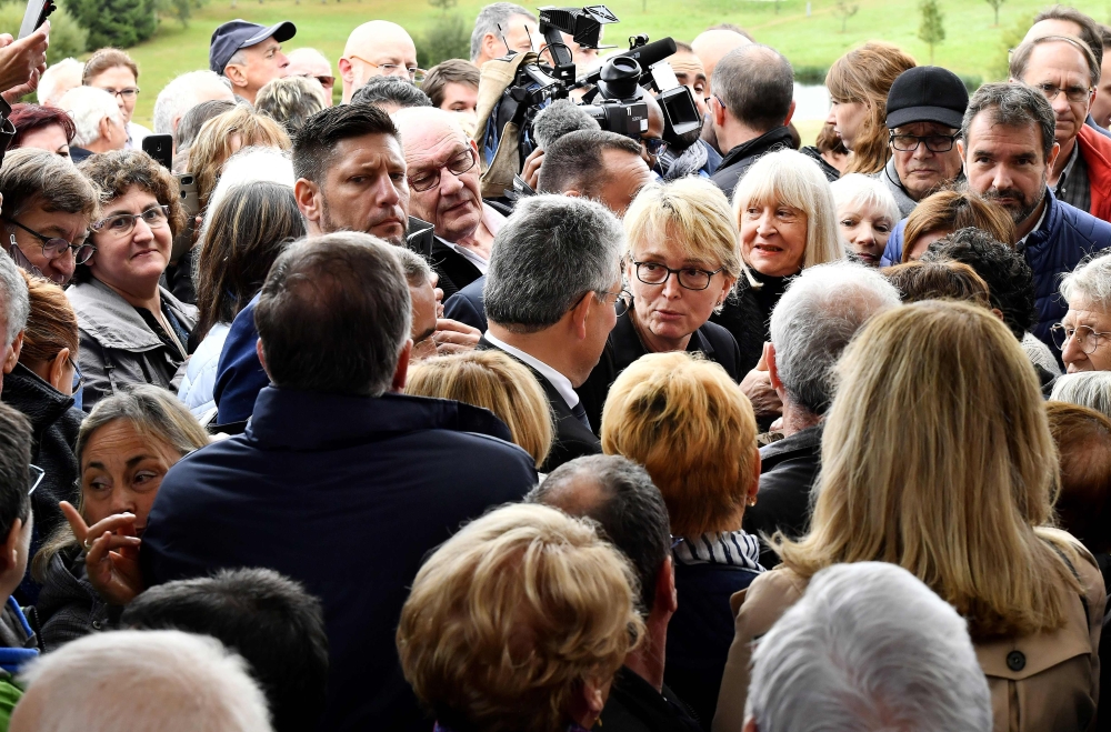 Claude Chirac (C, right), late Jacques Chirac's daughter, meets people during a tribute to the former French President in his region of origin, on October 5, 2019 in Sarran. Former French President Jacques Chirac died on September 26, 2019 at the age of 8