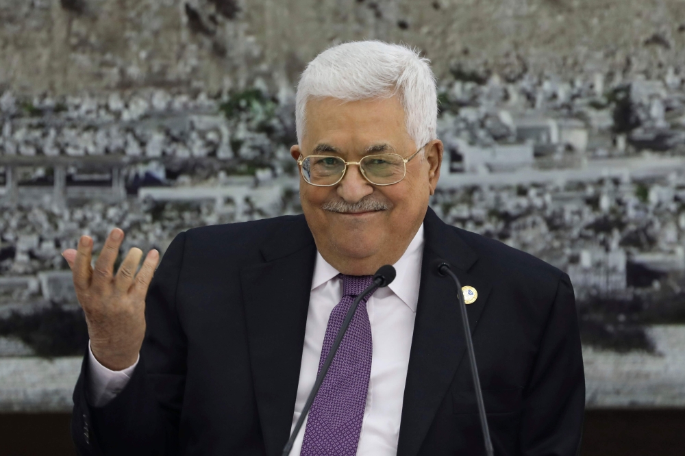 Palestinian President Mahmoud Abbas gestures during a meeting with the Palestinian leadership at the presidential compound in the West Bank city of Ramallah on October 6, 2019. AFP / Abbas Momani