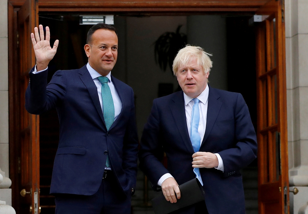 FILE PHOTO: Ireland's Prime Minister (Taoiseach) Leo Varadkar waves as he meets Britain's Prime Minister Boris Johnson in Dublin, Ireland, September 9, 2019. REUTERS/Phil Noble/File Photo