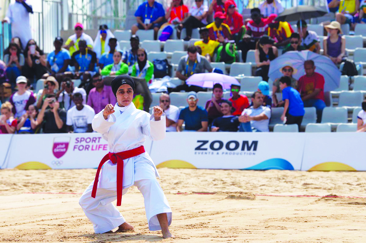 Qatar’s Mona Saud in action during the first round of the Women’s Individual Kata yesterday.
Picture: @qatar_olympic / Twitter