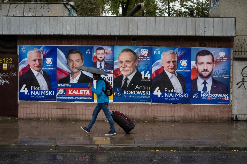 Election posters are pictured in Warsaw, Poland, on October 9, 2019. AFP / AFP PHOTO / Wojtek RADWANSKI 