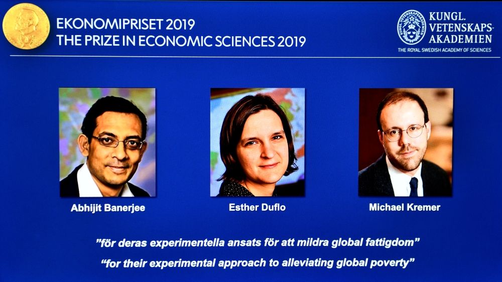  The portraits of Abhijit Banerjee, Esther Duflo, and Michael Kreme, who have been announced the Nobel Prize in Economic Sciences 2019 winners, are seen at a news conference at the Royal Swedish Academy of Sciences in Stockholm, Sweden, October 14, 2019. 