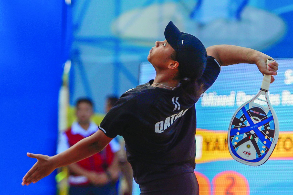 Qatar’s Mubaraka Al Naimi in action during the beach tennis mixed doubles at Katara Beach yesterday. Picture: Angelos Zymaras / Laurel Photo Services