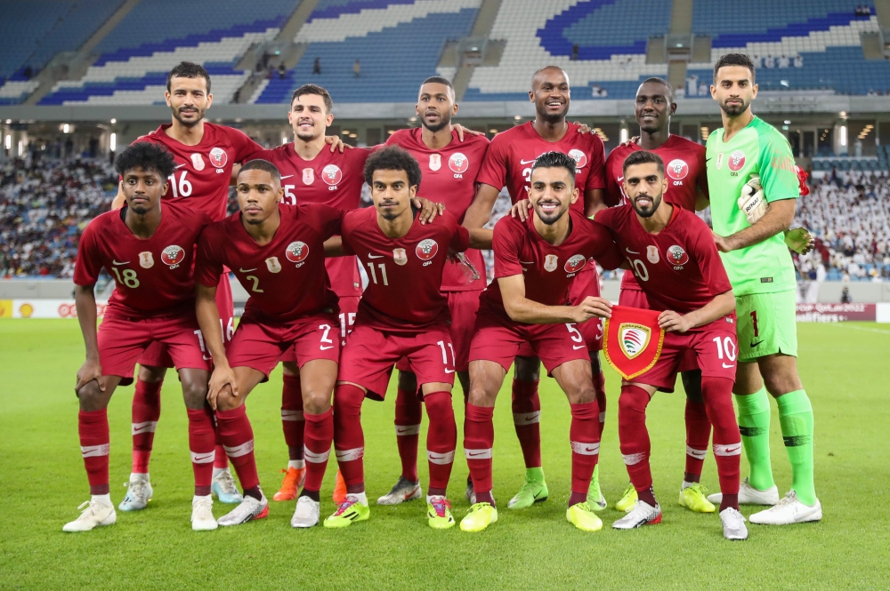 Qatar's starting eleven pose for a group picture ahead of the World Cup 2022 Asian qualifying match between Qatar and Oman at the Janoub Stadium in the Qatari capital Doha on October 15, 2019. AFP / Karim Jaafar 
