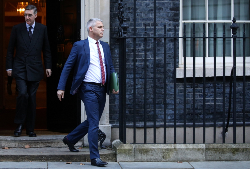 Britain's Leader of the House of Commons Jacob Rees-Mogg and Britain's Brexit Secretary Steve Barclay leave Downing Street in London, Britain October 17, 2019. REUTERS/Tom Nicholson 
