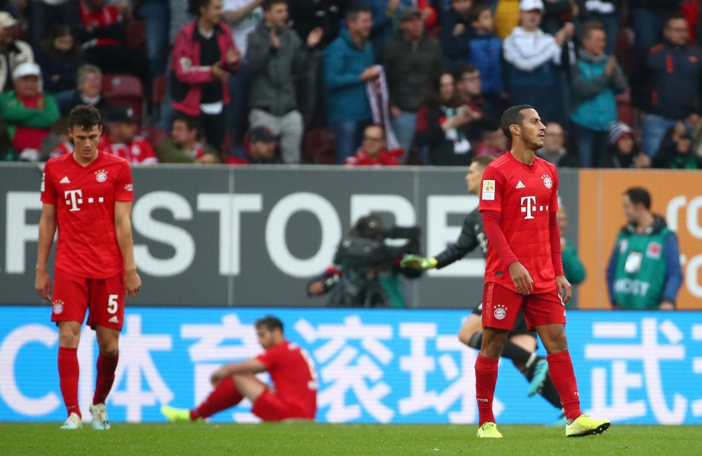 Bayern Munich's Thiago reacts after FC Augsburg's second goal REUTERS/Michael Dalder 