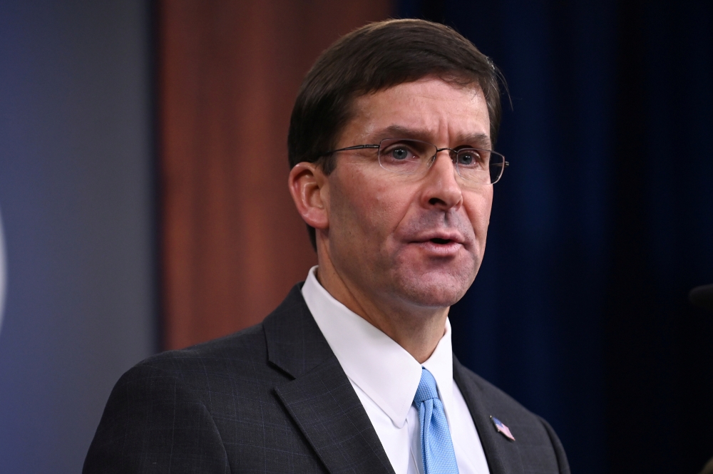 FILE PHOTO: U.S. Defense Secretary Mark Esper addresses reporters during a media briefing at the Pentagon in Arlington, Virginia, U.S., October 11, 2019. REUTERS/Erin Scott/File Photo