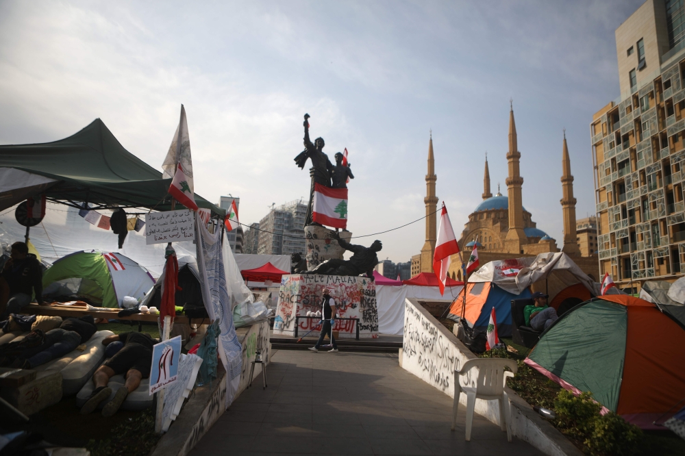 A makeshift camping site set up by Lebanese demonstrators is pictured in the capital Beirut's downtown district on October 26, 2019.  AFP / Patrick BAZ
