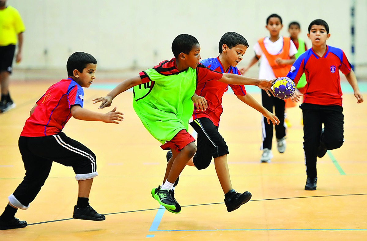 School students playing handball during the School Olympic Program in this file picture.