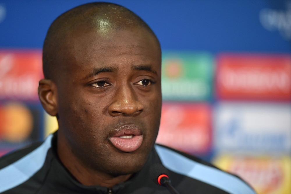 This file photo taken on December 5, 2017 shows Manchester City's Ivorian midfielder Yaya Toure addressing a press conference in Kharkiv, on the eve of the UEFA Champion League Group F football match against Shakhtar Donetsk. / AFP / GENYA SAVILOV