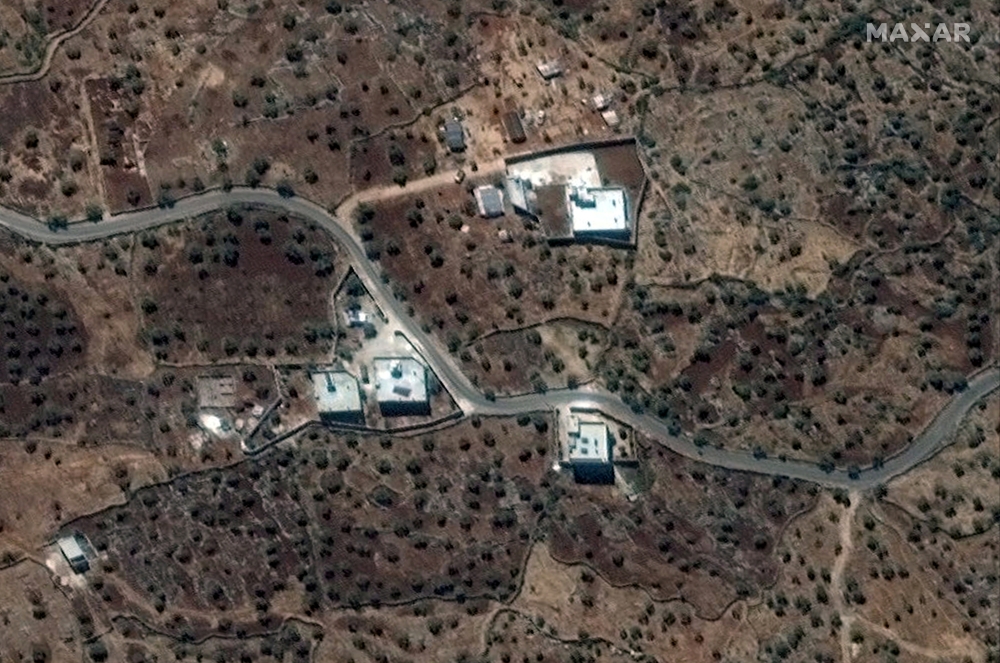A satellite view of the reported residence of ISIS leader, Abu Bakr al-Baghdadi, according to the source, near the village of Barisha, Syria, collected on September 28, 2019, is shown in this handout image released on October 27, 2019 by Maxar Technologie