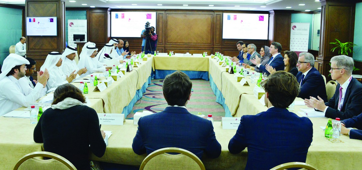 Members of the Qatari-French Business Association (QADRAN) reviewing the bilateral cooperation between the private sector businesses from the two countries, during a meeting held at the Qatar Chamber headquarters, yesterday.