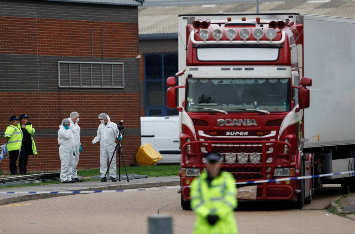 Police are seen at the scene where bodies were discovered in a lorry container, in Grays, Essex, Britain October 23, 2019. Reuters/Hannah McKay