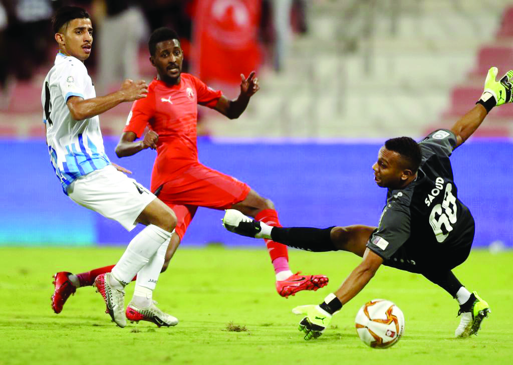 Mohammed Salah El Neel (centre) scoring Al Arabi’s first goal against Al Wakrah.