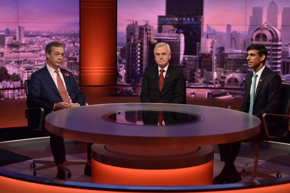 Brexit Party leader Nigel Farage, Britain's Labour Party's Shadow Chancellor John McDonnell and Chief Secretary to the Treasury Rishi Sunak appear on BBC TV's The Andrew Marr Show in London, Britain, November 3, 2019. Jeff Overs/BBC/Handout via REUTERS