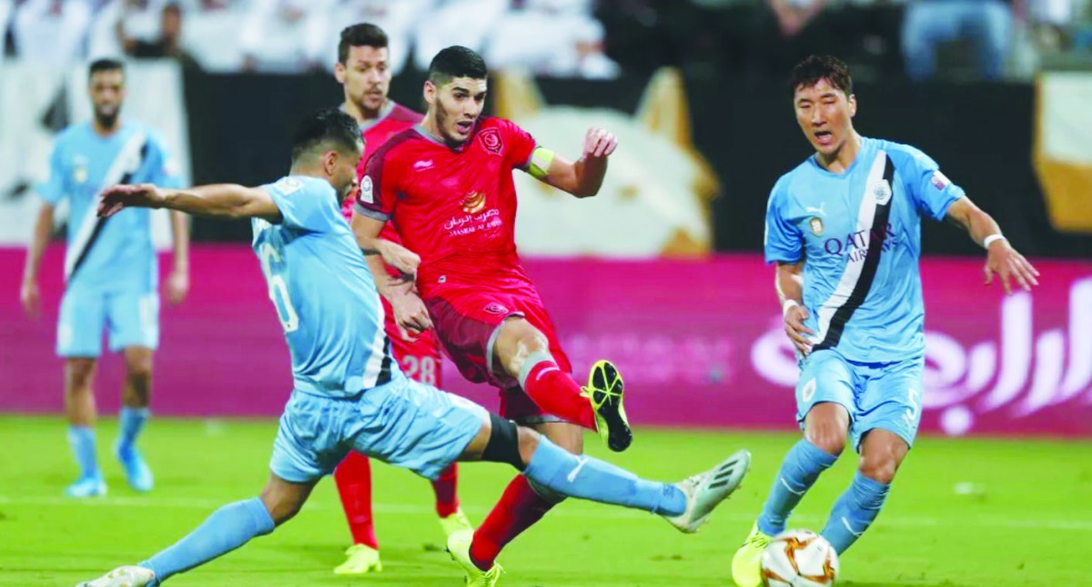 Al Duhail and Al Sadd players in action during their match at Al Duhail Stadium on Saturday. 