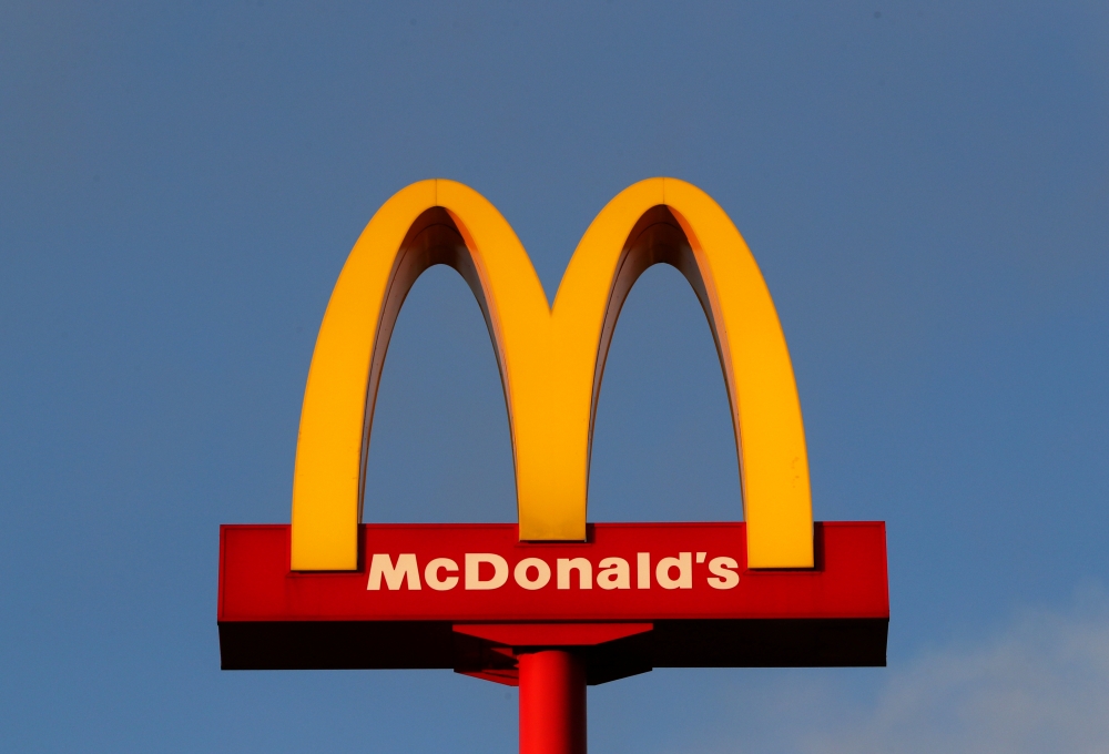 A sign for the US fast food restaurant chain McDonald's is seen outside one of their restaurants in Sint-Pieters-Leeuw, near Brussels, Belgium January 30, 2019. Reuters/Yves Herman