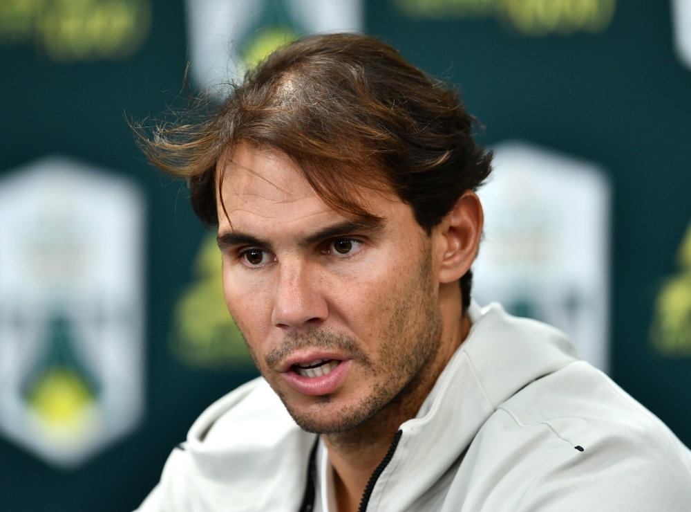 Rafael Nadal of Spain makes a statement to announce his withdrawal from his men's singles semi-final tennis match after got injured during the Rolex Paris Masters tennis tournament at AccorHotels Arena in Paris, France on November 02, 2019. ( Mustafa Yalç