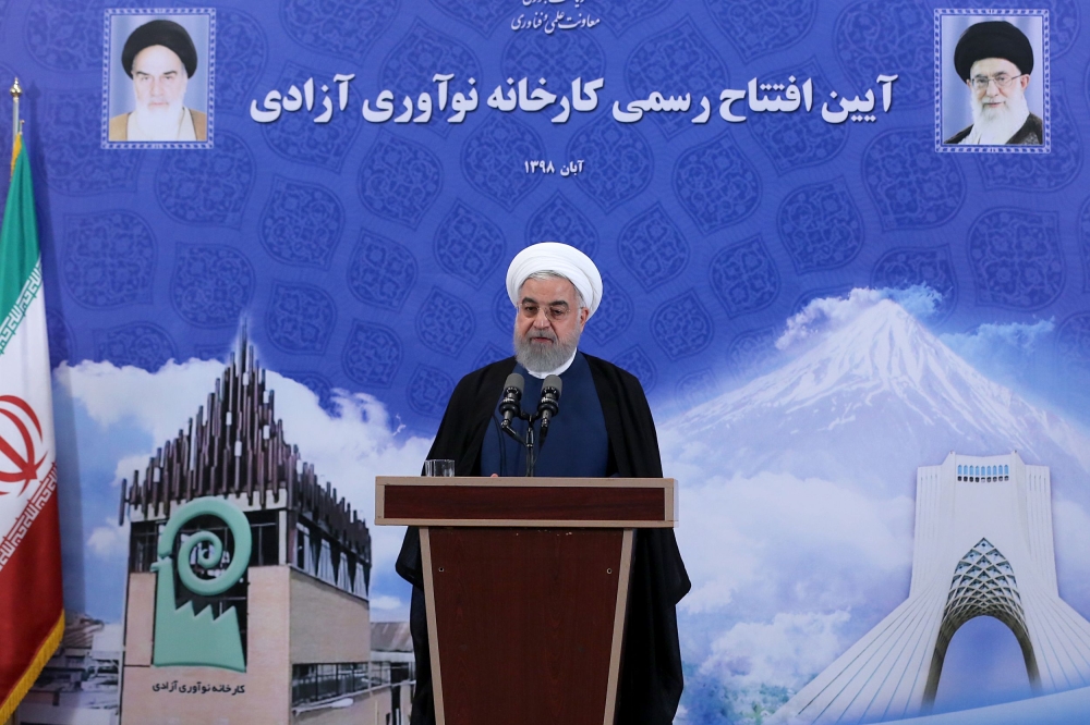 A handout picture provided by the Iranian presidency on November 5, 2019, shows President Hassan Rouhani speaking during the opening of a factory in the capital Tehran. AFP / HO / IRANIAN PRESIDENCY