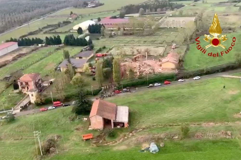 This aerial photo was taken and handout on November 5, 2019, by the Italian National Firefighters Corps (Vigili del Fuoco) shows the debris of an inhabited building that exploded overnight in Quargnento, in the northern Piedmont region. AFP PHOTO / VIGILI