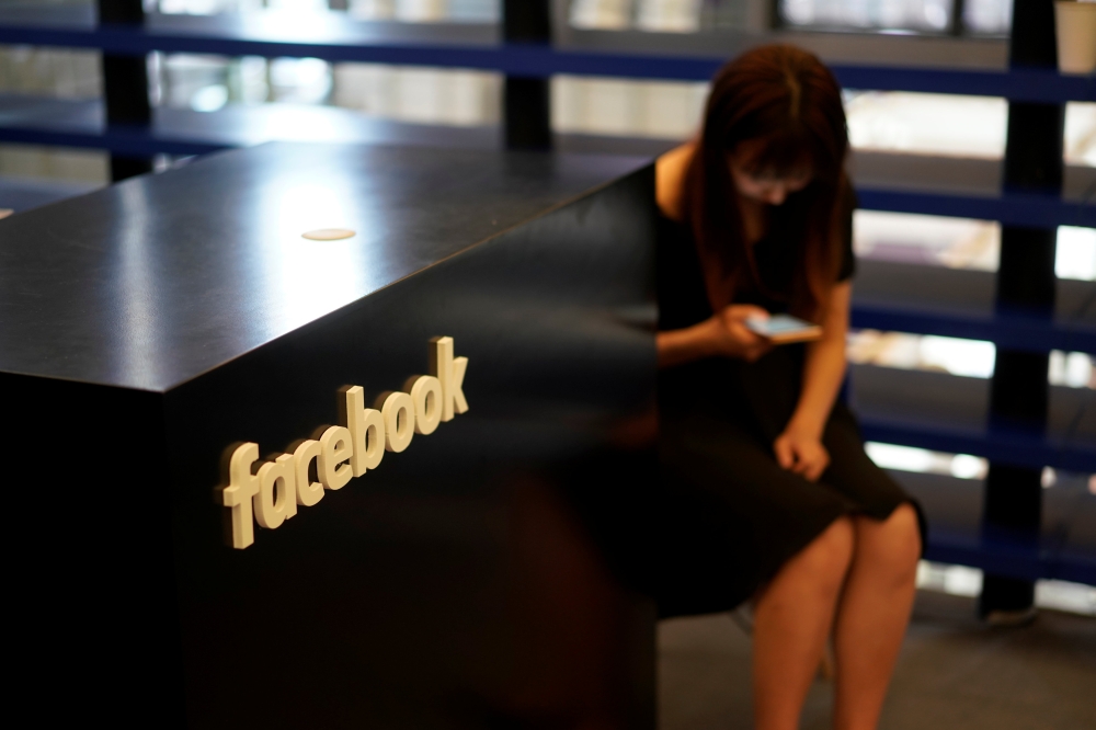 A Facebook sign is seen during the China Digital Entertainment Expo and Conference in Shanghai, August 3, 2018. Reuters / Aly Song