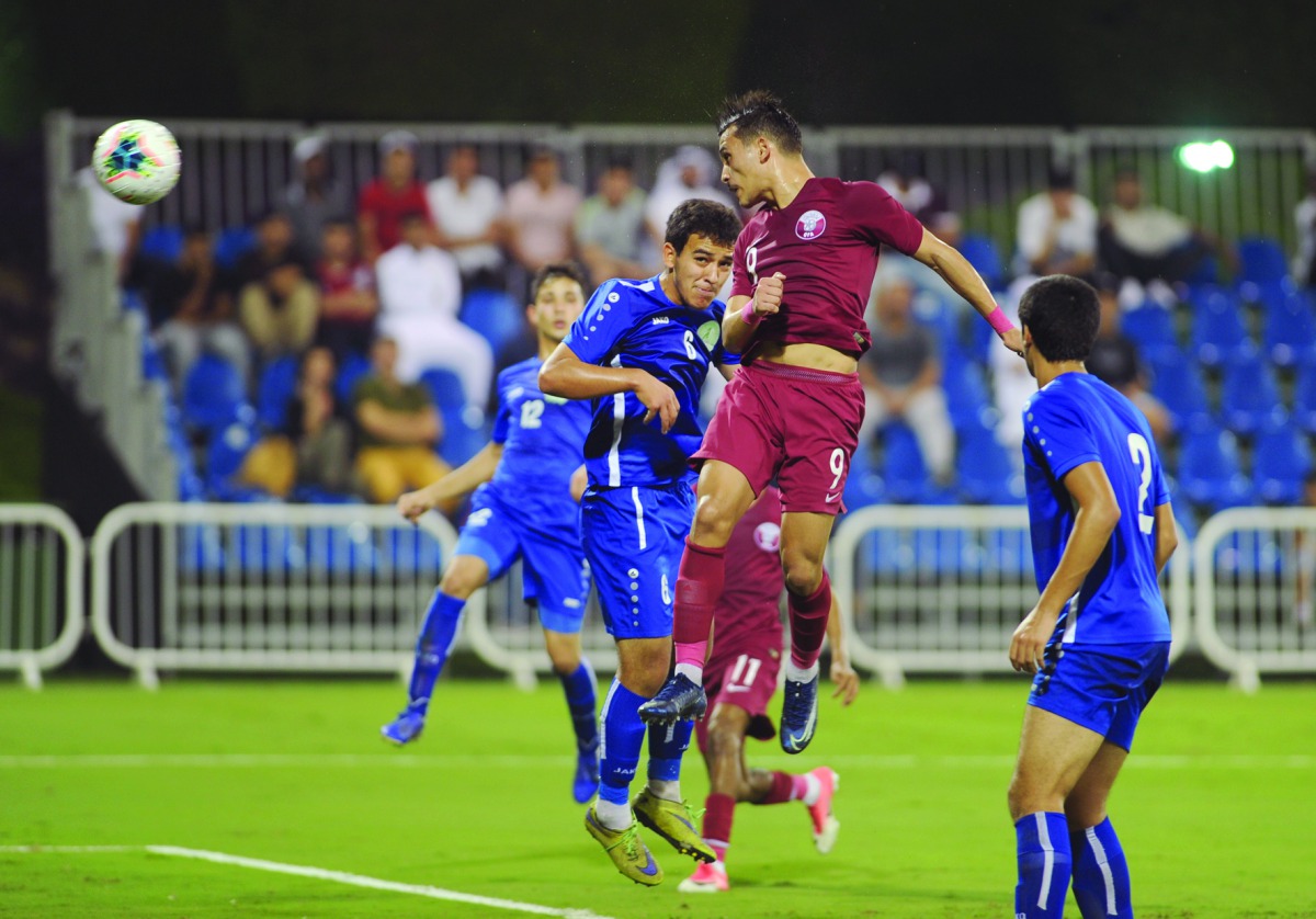 Qatari forward Mekki Mohsen Tombari scoring his second goal against Turkmenistan during their AFC U-19 Championship match yesterday.