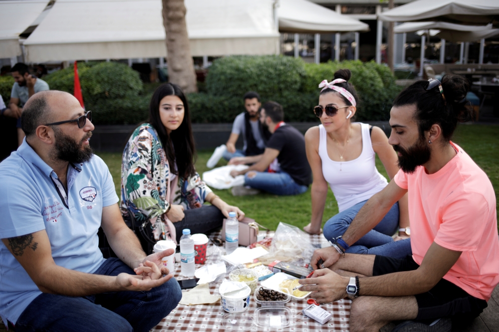 People participate at a breakfast organised to protest in a privately-run Zaytouna Bay, during the ongoing anti-government protests in Beirut, Lebanon November 10, 2019. Reuters / Andres Martinez Casares
