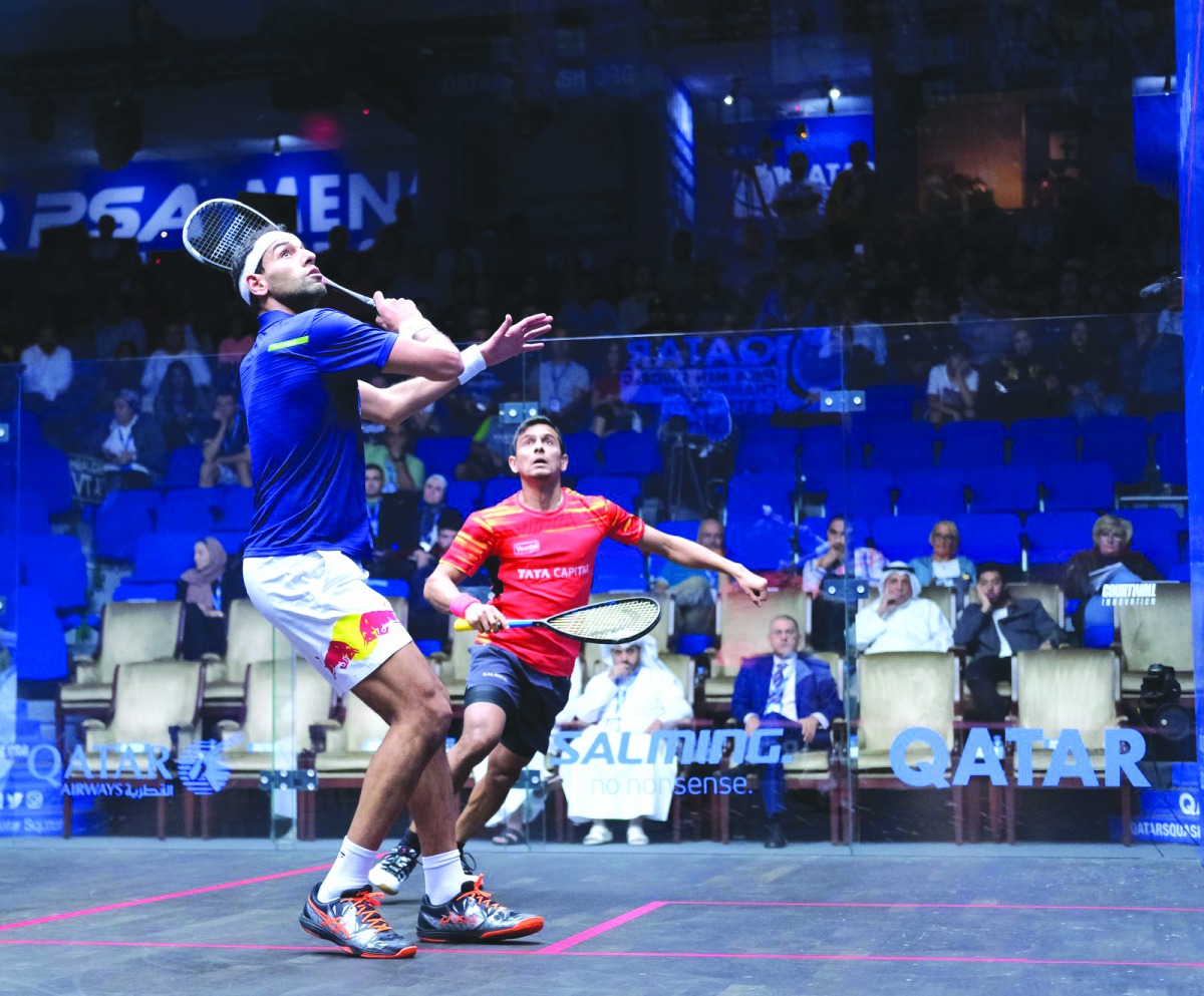 Top seed Mohamed El Shorbagy (left) in action against India’s Saurav Ghosal during their pre-quarter-final  match yesterday.